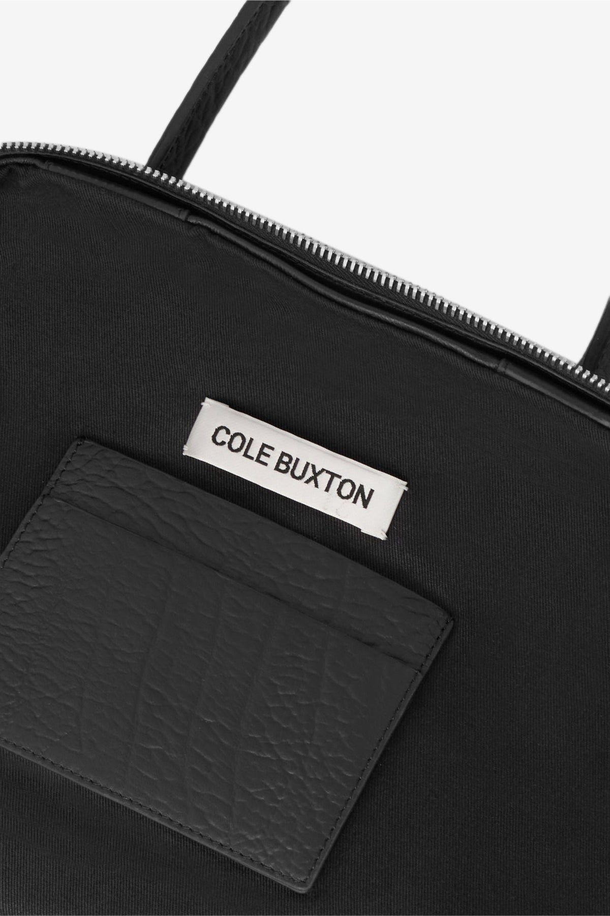 Creased leather military duffle